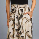 Skirt with abstract black pattern on a white background