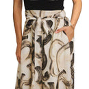 Skirt with abstract black pattern on a white background