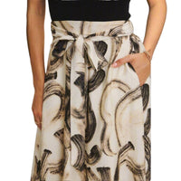 Skirt with abstract black pattern on a white background